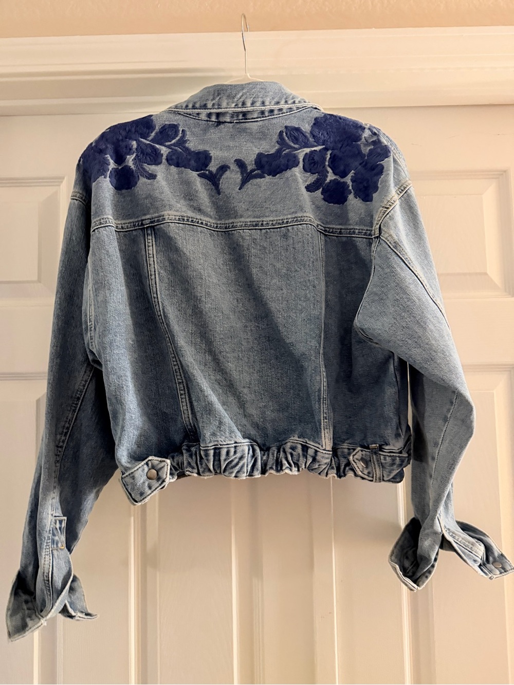 Free People Light Wash Denim Jacket with Navy Floral Appliqué